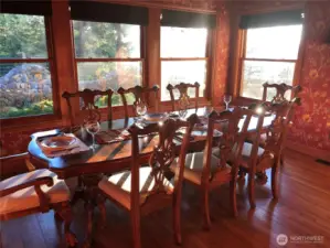 Formal dining room with spectacular light and views over the gardens and East Sound