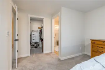 Primary suite includes walk-in closet and 3/4 bathroom