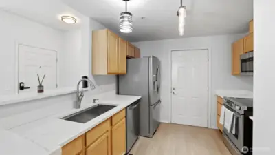 Spacious kitchen peninsula with bar seating — perfect for casual meals or morning coffee