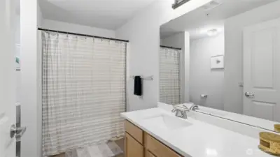 A thoughtfully designed guest bath offering both style and everyday convenience.