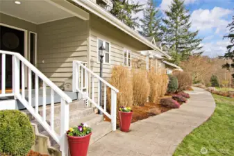 andscaped walkway leading to the front entry.