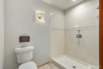 Italian Tile Shower, “Jerusalem” natural stone flooring.