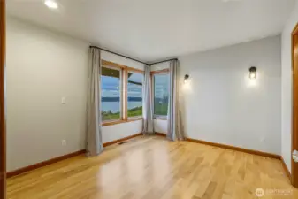 Main floor view “bonus” room adjoining for flex space or additional guest room, 3 bed septic but 5 total “rooms”.