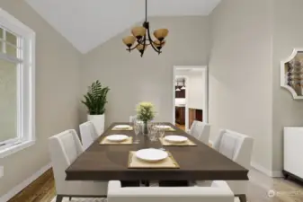 Formal dining room, virtually staged.