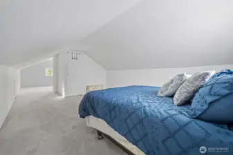 Spacious bedroom upstairs.