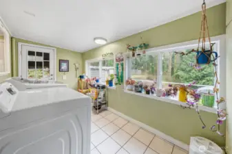 Wall of windows making this a perfect plant room.