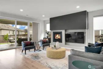 A cozy gas fireplace highlights the family room and adds ambiance to this spacious and comfortable great room.