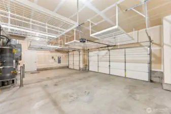 3 car garage with over head storage and man door