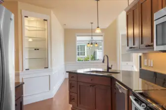 Showcase your favorite décor with beautifully crafted shelves featuring integrated lighting for a stunning focal point.