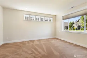 Relax in the serene primary suite, complete with a generously sized ensuite bathroom for ultimate comfort and privacy.
