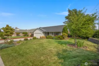 Level yard, fenced back yard with shade trees