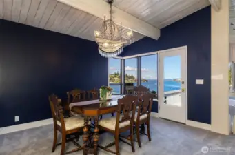 Dining room opens to view deck.