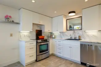 Lower level dine in kitchen is updated and has stainless appliances.