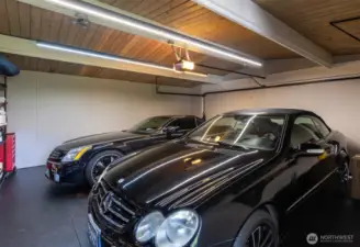 Double garage with level, covered entry to home.