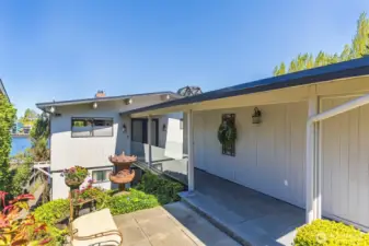 Level entry home and covered from garage.