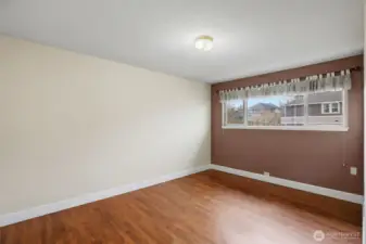 Bedroom one with generous closet space.