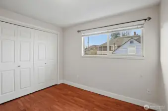 Bedroom two with generous closet space.