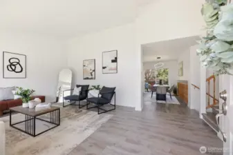 You're greeted with vaulted ceilings, lots of natural light and luxury vinyl plank flooring throughout.