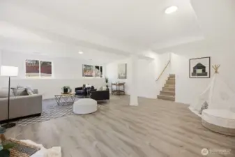 Lower flex space offers  many possibilities. Ideal for home office, guest area, workout room, media space, or playroom.