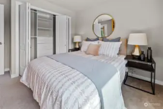 Two large well appointed bedrooms with built in storage and closet organizers
