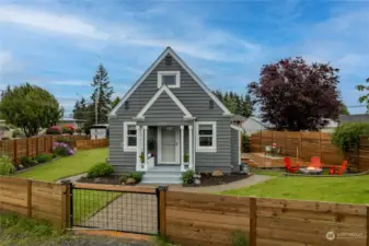 Welcome to a Classic updated Craftsmen's home on a corner/double lot! A custom fence fully encloses this stunning yard with mature landscaping. Rasberrys, apple tree and garden space.