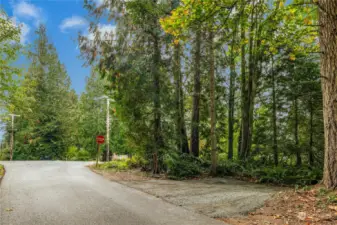 Use the parking pad at the east side of Lot B for easy trail access across both lots