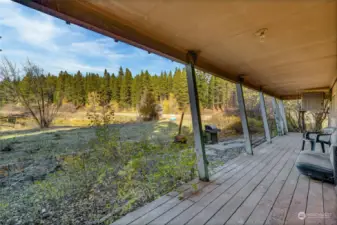 Covered back deck facing pond