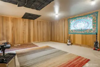 Recording Studio. Expensive Cedar Paneling and sound proofed. Could be converted back to garage space, or Primary Bedroom or use your creative imagination!