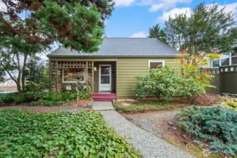 Sweet 1944 home on a corner lot, elevated from the street and surrounded by mature landscape. A rare combination of careful updating, meticulous maiintenance.