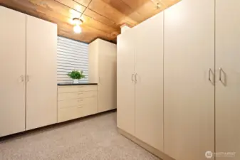 Storage galore in this basement nook! Everything is neat and clean.