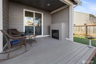 Cozy covered patio with gas fireplace