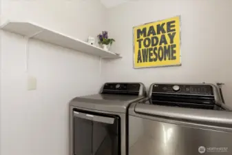 Laundry room also doubles as a mudroom with its exterior door.
