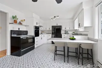 Kitchen with double oven and eating space