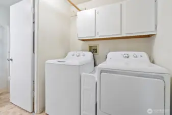 Laundry room located off of the bathroom