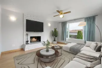 ADU - Enter into the light and bright living room with fireplace.