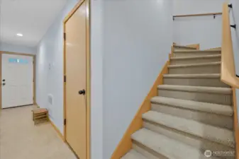 Entry foyer leading to garage