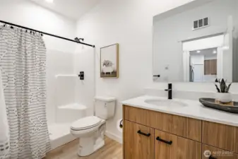 Photos shown are of a similar floor plan previously built in a different neighborhood (The Ridge in Blaine). Finishes and features may vary. Some items pictured reflect buyer-selected upgrades which are not included in the base price and may be added at an additional cost.