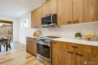 Photos shown are of a similar floor plan previously built in a different neighborhood (The Ridge in Blaine). Finishes and features may vary. Some items pictured reflect buyer-selected upgrades which are not included in the base price and may be added at an additional cost.
