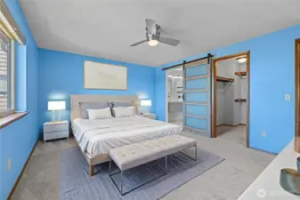 Spacious Primary bedroom with walk-in closet and remodeled bathroom.