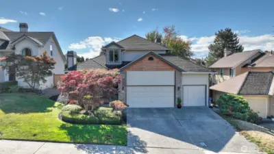 Welcome home! Tucked within the quiet Hunters Run neighborhood of Kent, step inside to discover  light-filled living spaces w/an open layout. The kitchen features quartz counters, SS appliances, W/I pantry & tons of  counter & storage space. Enjoy two living spaces each w/their own fireplace. Retreat to the spacious primary w/its  updated, spa-like ensuite & ample closet space. Additional guest rooms offer flexibility for a home office, guest space,  or media room. Recent updates throughout provide peace of mind--newer gutters, fresh interior/exterior paint & mostly  all new windows. Heat pump for year round comfort. Outdoors, enjoy your own private retreat w/mature landscaping,  herb garden & space for gatherings or relaxing.