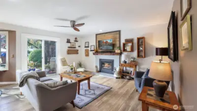 Relax in this bright and welcoming living area with a second fireplace seamless indoor-outdoor flow.