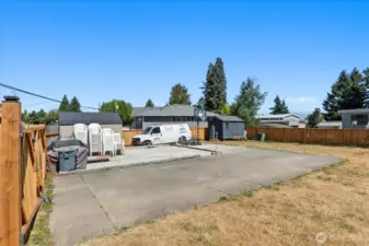Standing in lot A (backyard of house #A) & looking towards lot C.  Lot C is about a 1/3 onto the concrete pad from lot A, so the gate will need to be adjusted if lot A isn't sold with lot C.