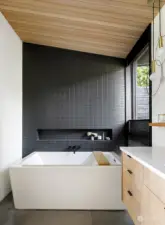 Primary Bathroom with garden view.