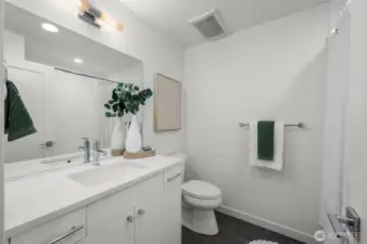 Photos of model home 9213 with similar finishes & floor plan.