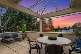 The oversized patio is covered for year round enjoyment of the western views.