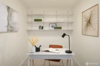 Den area perfect for an at home office and/or a space for guests! Fresh carpet just installed.