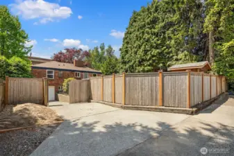 Alley parking spot. Note the new fence, driveway gate and side gate.