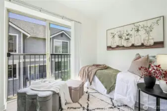 Bedroom #2 has a sweet little balcony space