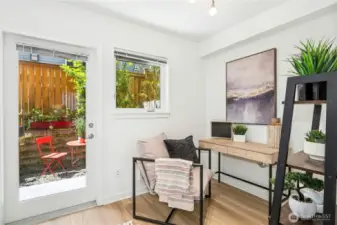 Downstairs room is a flexible space for home office or roomate