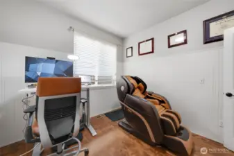 Office located downstairs. All furniture is for sale including this amazing massage chair!